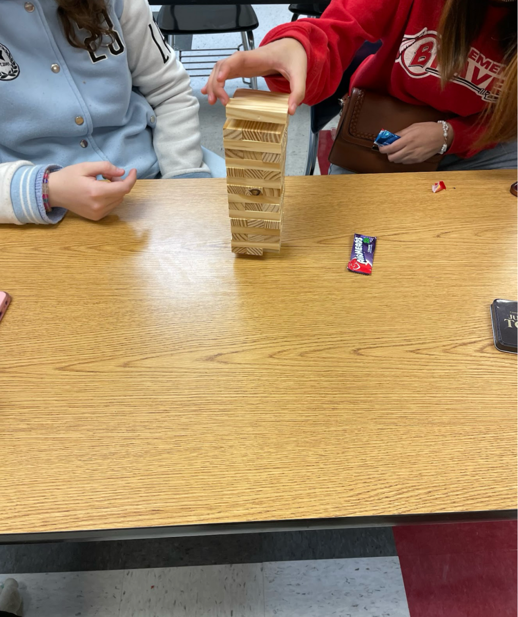 GSA, Oracle, Anime and Art Club members participate in game night on Dec. 10. The groups joined together to give students a chance to socialize and make connections with one another.